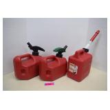 Three Plastic Gas Cans