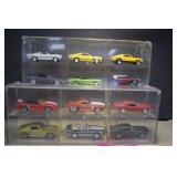 Twelve Diecast Cars In Hanging Display Shelves -