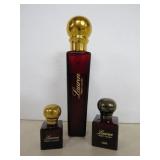 Three Empty Ralph Lauren Perfume Bottles