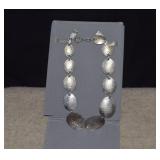 Sterling Hammered Discs Necklace in Folding