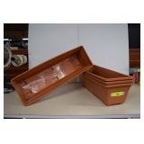 4 Elongated Plastic Planters