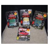 Four Racing Champions Die Cast Cars in Pkg