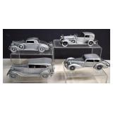 Four Danbury Mint Pewter Cars