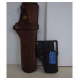 Two Gun Holsters - One Leather & One Plastic For