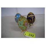 Three Franklin Mint Faberge style eggs on Stands