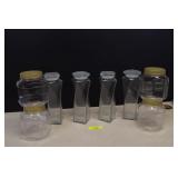 Four Twisted Glass Jars w/Lids & Four Plastic Jars