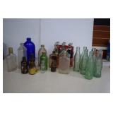 Collection Of Bottles and Coke Bottles
