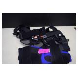 Two Knee Braces. One Adjustable