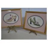 Two Brass Picture Easels With Framed Shoe Prints