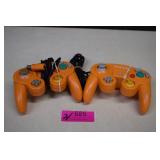 Two Nintendo Gamecube Controllers