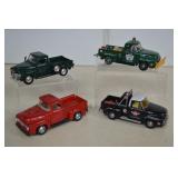 Four Diecast Trucks Matchbox & Road Champs
