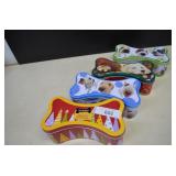 Four Tin Christmas Dog Treat Containers (empty)