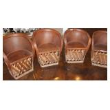 Four Mexican Equipale Barrel Chairs