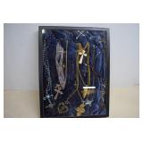 Assorted Crosses & Rosaries In Glass Top Display