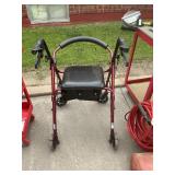 Walker/chair handicap device.