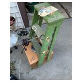 Heat lamps, small step ladder, box of rags