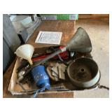 Funnels oil, cans pipe wrenches, one money