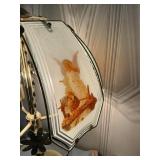 Brass table lamp with glass shade, angel theme.