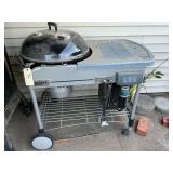 Webber performance series charcoal grill .