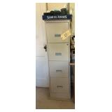 Four drawer filing cabinet with miscellaneous off.