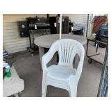PVC patio furniture table in four chairs