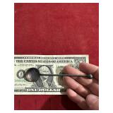 830 SILVER SM. METAL SPOON CARIBOU ON IT