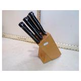 **4 J.A. HENCKELS GERMAN KNIVES IN BLOCK