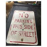 **NO PARKING THIS SIDE OF THE STREET SIGN