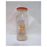 TIM'S DAIRY EAU CLAIRE MILK BOTTLE W/LID