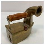 Antique brass coal iron