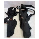 Two shoulder holsters. S&W and Uncle Mikeï¿½s