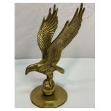 Solid brass eagle. 9 inches tall.