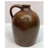 Antique beehive crock jug
