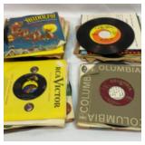 Big grouping of 45s. A lot of sleeves
