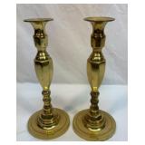 Two solid brass candlesticks. 11 inches tall.