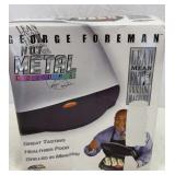 New George Forman grilling machine