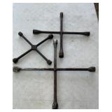 Three four-way tire wrenches
