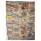 Hand stitched patchwork quilt
