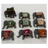 Old cast lead decorated circus elephants