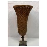 Wicker and cast-iron umbrella stand
