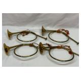 Four 13 inch brass horns