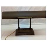 Antique metal desk lamp with brass inlay