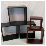 Two sets of floating wall shelves