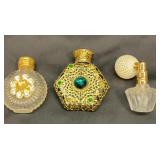 Three vintage perfume bottles