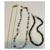 Three eyeglass clip necklaces