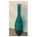 Large greenish blue glass vase.  39 inches tall.