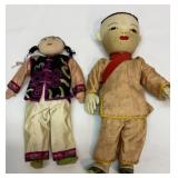 Two all-cloth Asian dolls