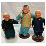Three Asian dolls