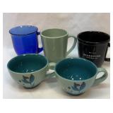Five Starbucks coffee mugs