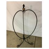 Metal plant holder. 40 inches tall.
